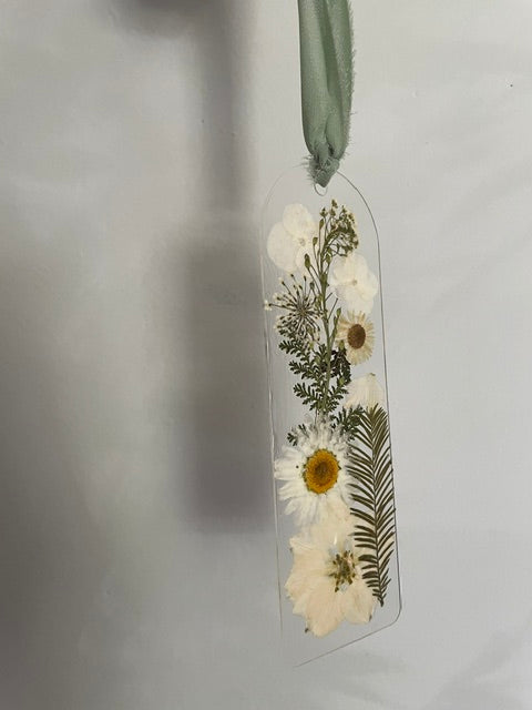 Bookmarks embellished with delicate dried flowers.