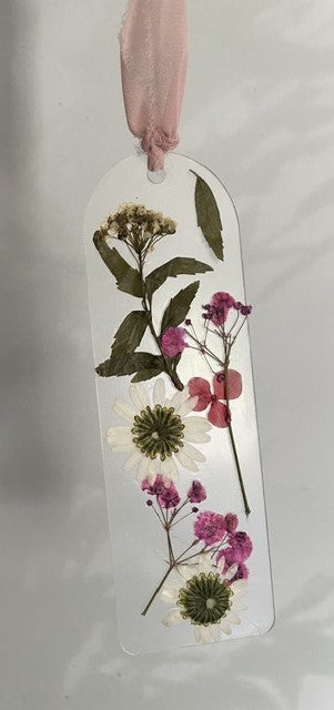 Bookmarks embellished with delicate dried flowers.