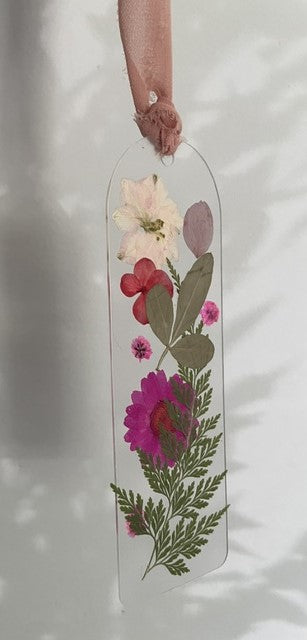 Bookmarks embellished with delicate dried flowers.