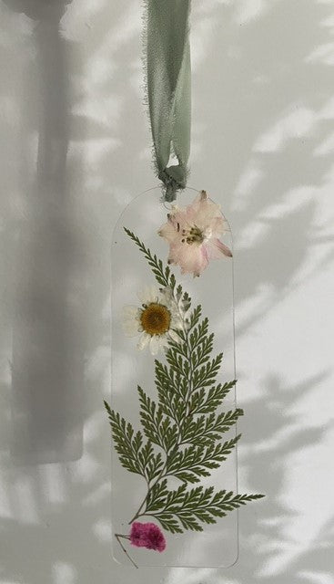 Bookmarks embellished with delicate dried flowers.
